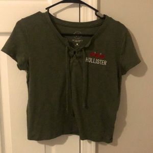 Army green top with roses